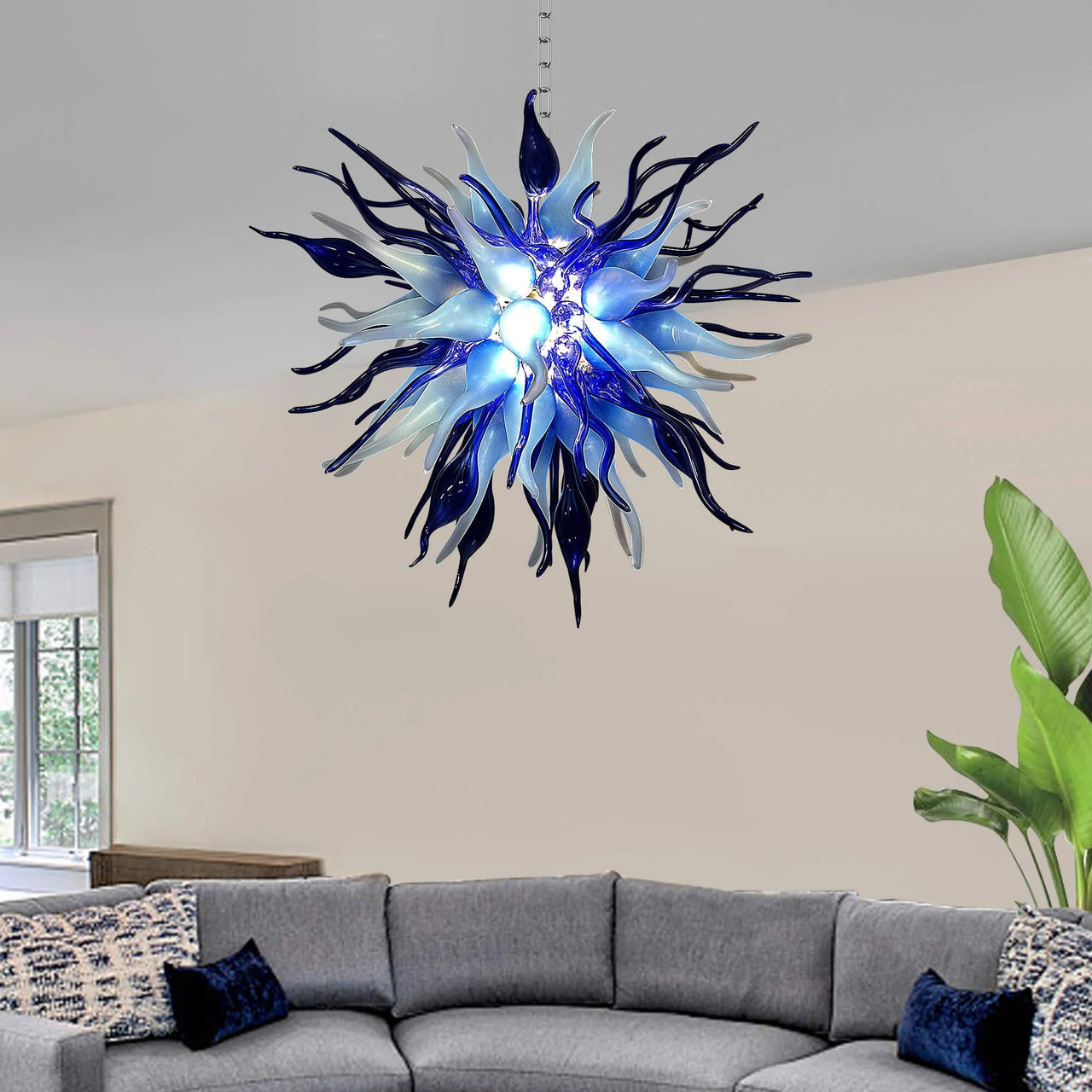 Modern Black Ice blown glass chandelier with LED lighting, designed to add a luxurious touch to contemporary interiors.
