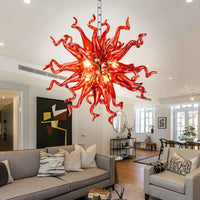 Ruby chandelier with blown glass design, adding a touch of warmth and luxury with its rich red color.
