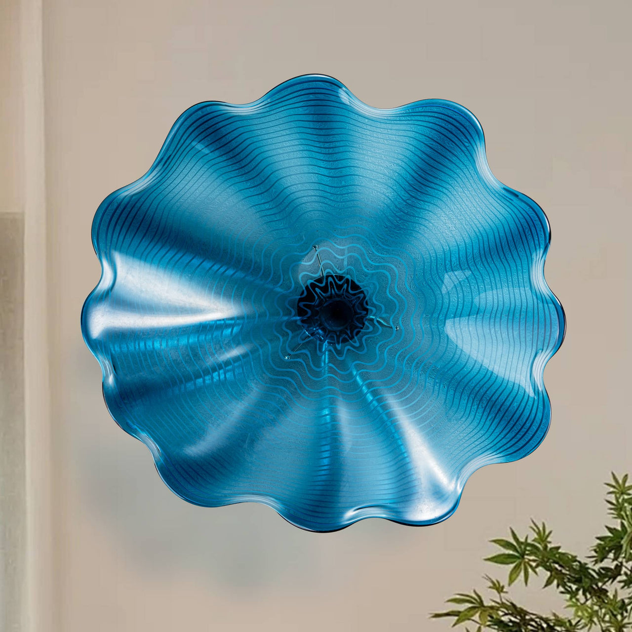 Elegant Celestial Blue Murano glass wall plates, perfect for upscale, modern interiors.